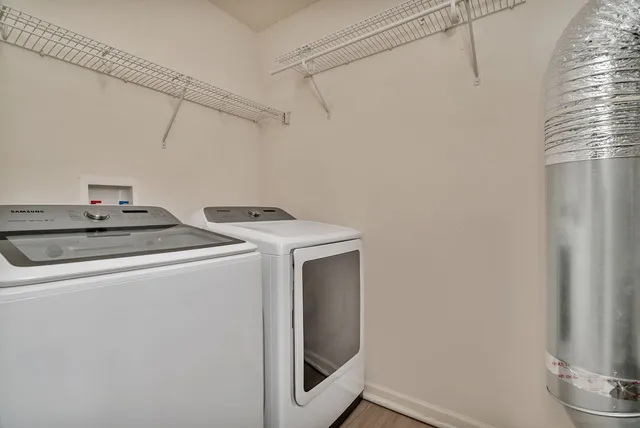 a utility room with dryer and washer