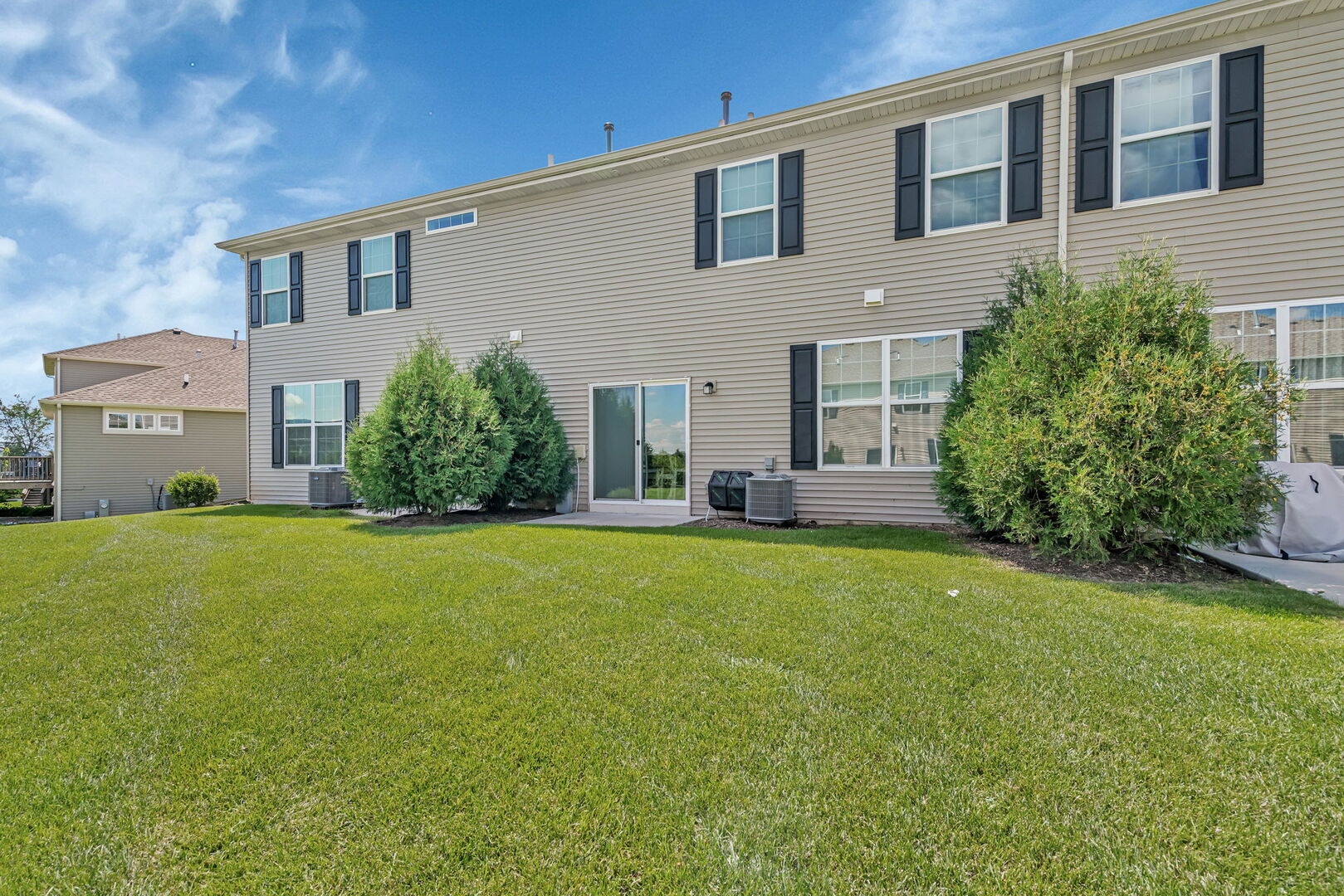 1334 Hawk Hollow Drive Yorkville, IL 60560 - Photo 24 of 28 a view of a house with backyard and garden