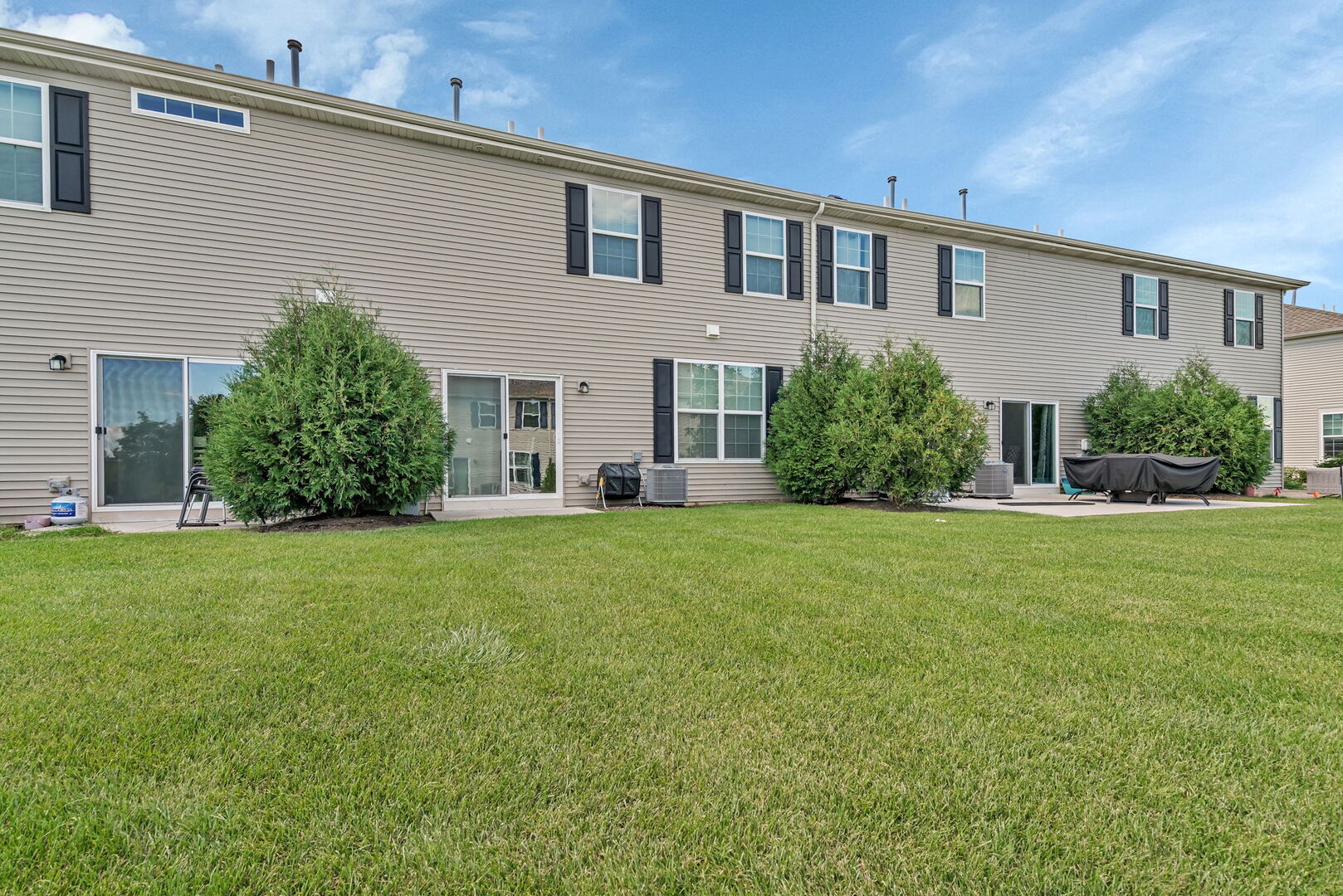 1334 Hawk Hollow Drive Yorkville, IL 60560 - Photo 25 of 28 a front view of house with yard and green space