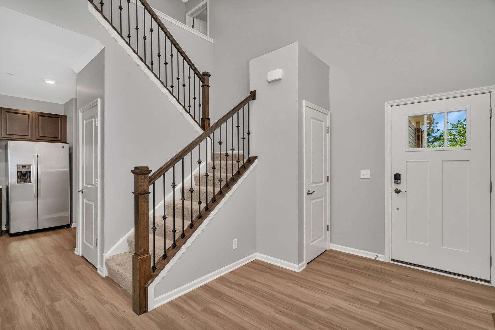 1334 Hawk Hollow Drive Yorkville, IL 60560 - Photo 3 of 28 a view of an entryway with wooden floor