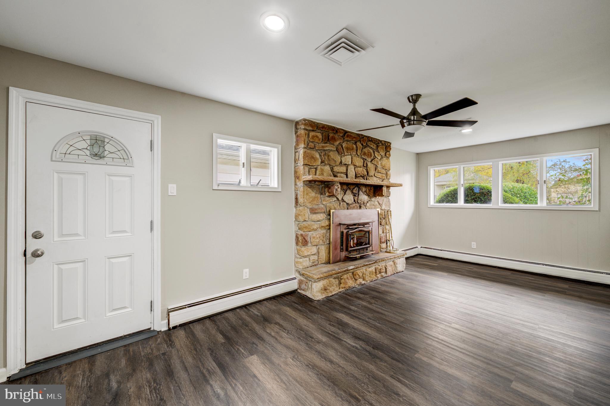 4255 Somerton Road Feasterville-Trevose, PA 19053 - Photo 23 of 37 wooden floor in an empty room with a window