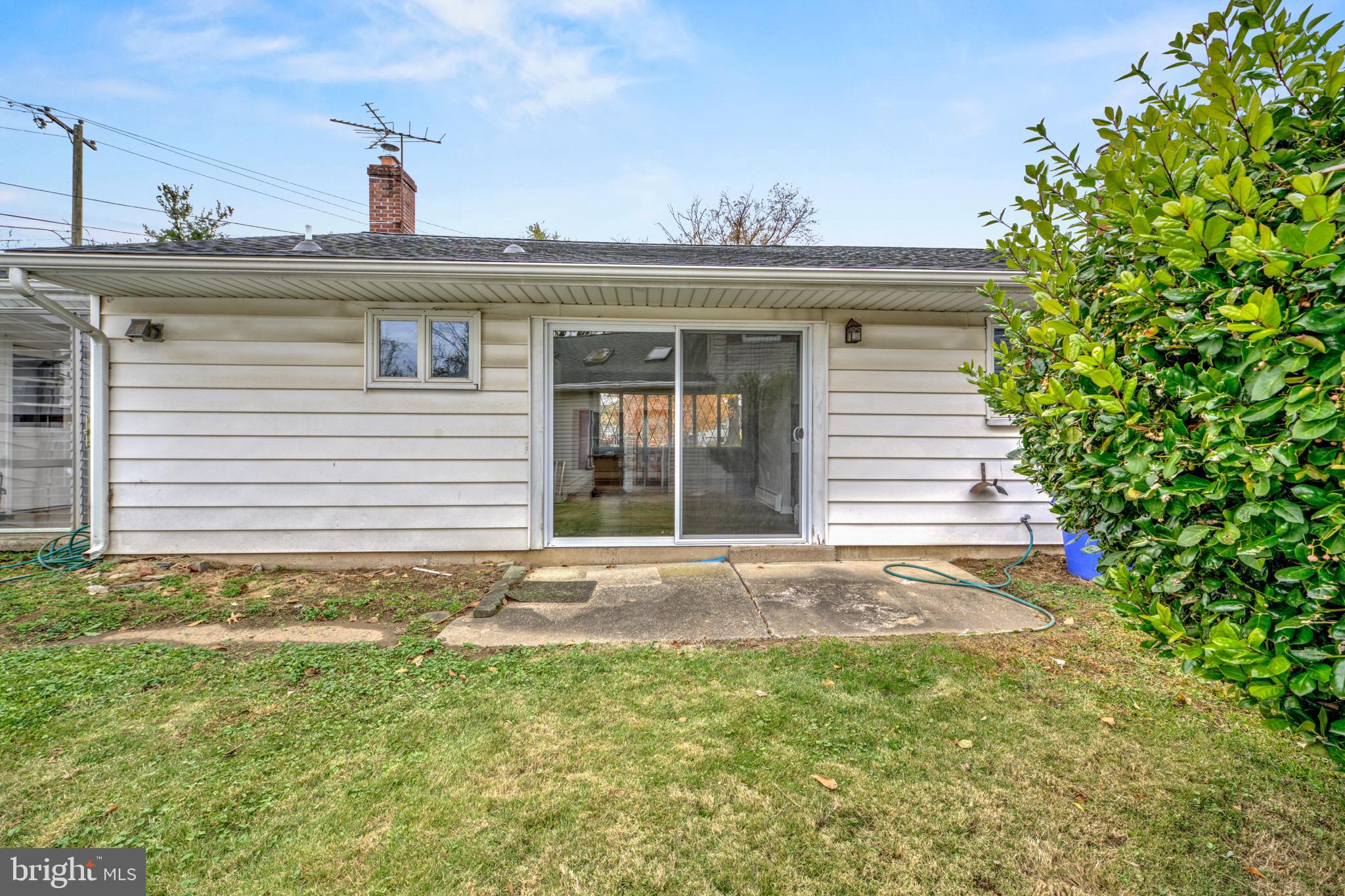4255 Somerton Road Feasterville-Trevose, PA 19053 - Photo 34 of 37 a view of a house with a small yard and plants