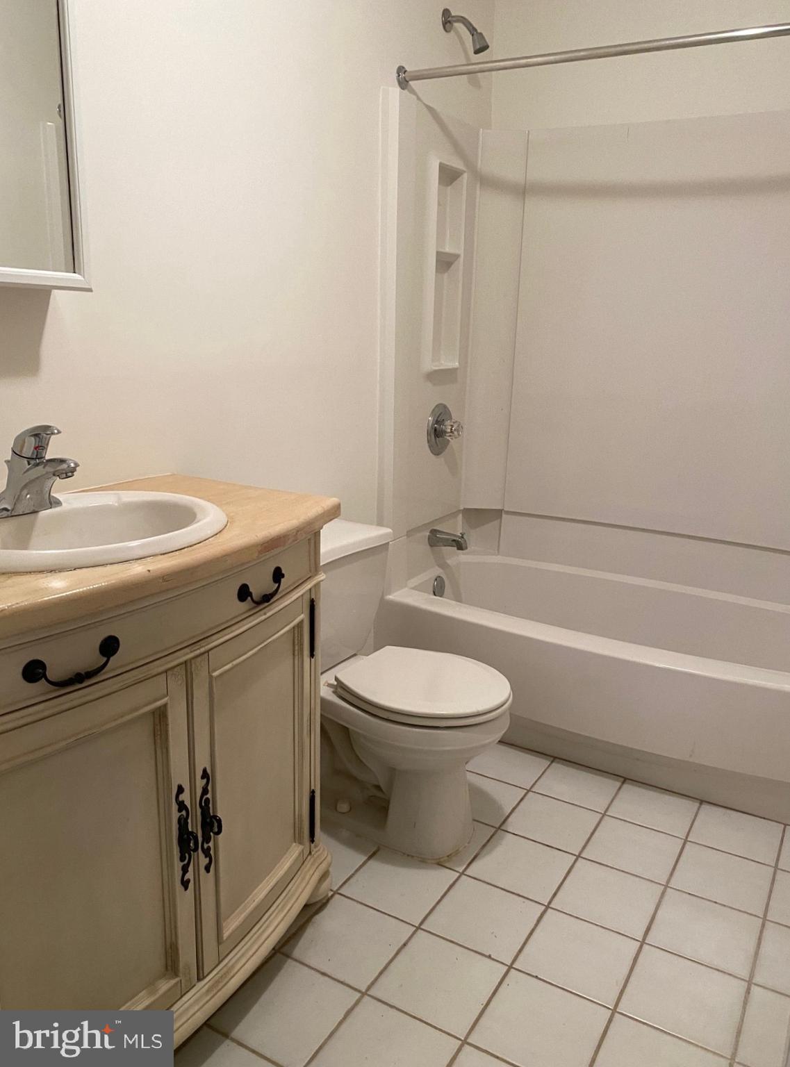 4 Wolf Avenue Reisterstown, MD 21136 - Photo 17 of 39 a bathroom with a toilet a sink and bathtub