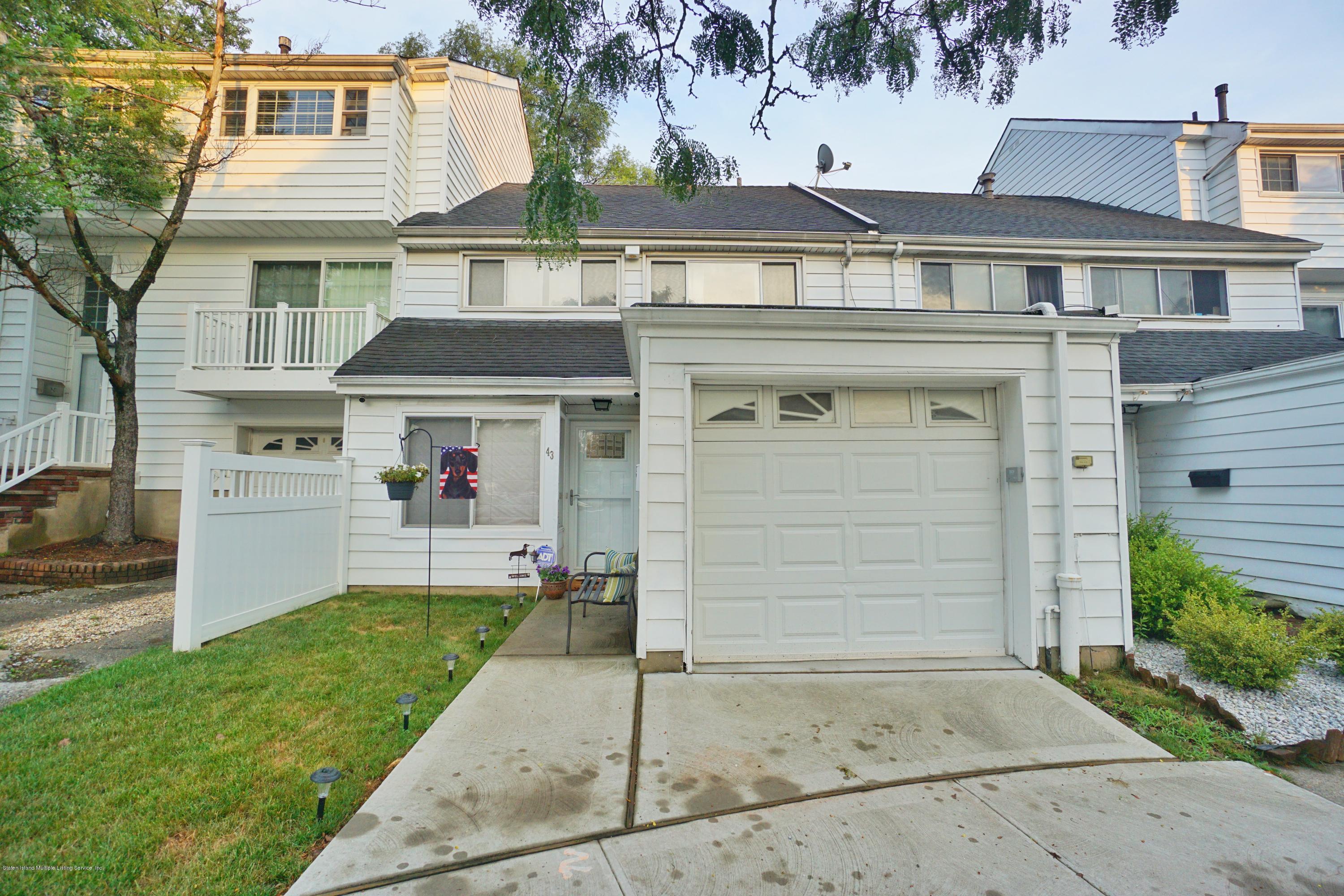 43 Forest Green Staten Island, NY 10312 - Photo 30 of 30 front view of a house with a yard