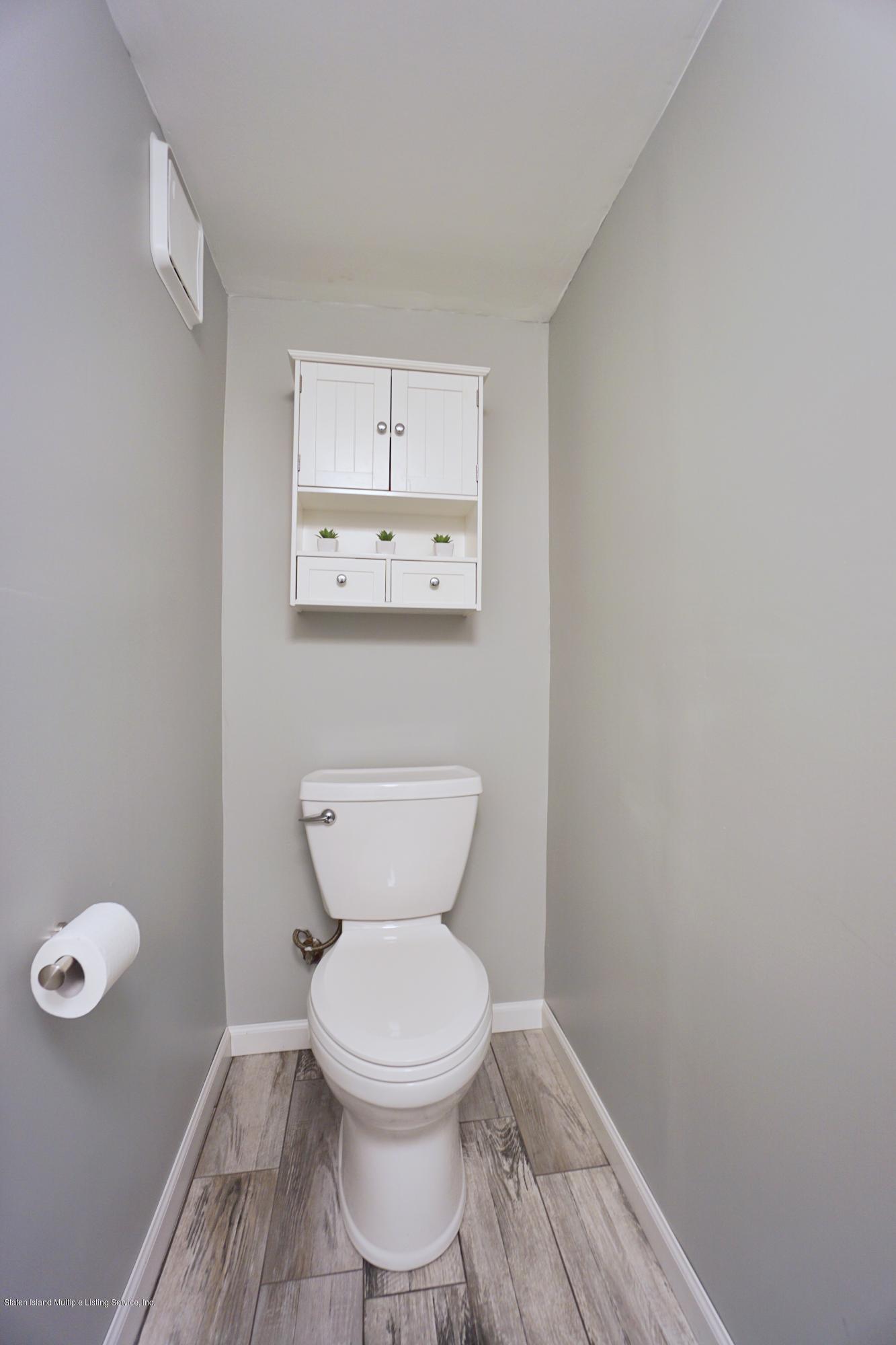 43 Forest Green Staten Island, NY 10312 - Photo 10 of 30 a bathroom with a toilet