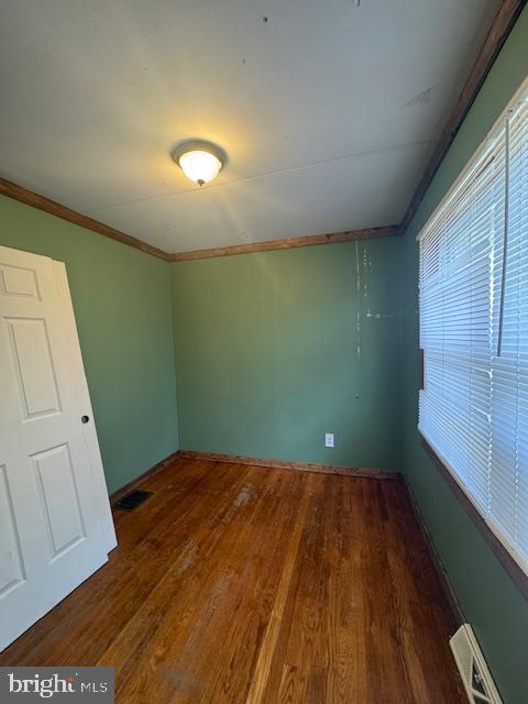 300 Locust Street Burnham, PA 17009 - Photo 11 of 35 a view of empty room with wooden floor
