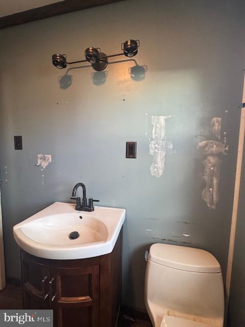 300 Locust Street Burnham, PA 17009 - Photo 18 of 35 a bathroom with a sink a toilet and mirror