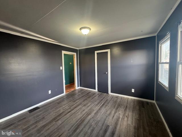 300 Locust Street Burnham, PA 17009 - Photo 9 of 35 a view of an empty room with wooden floor and a window