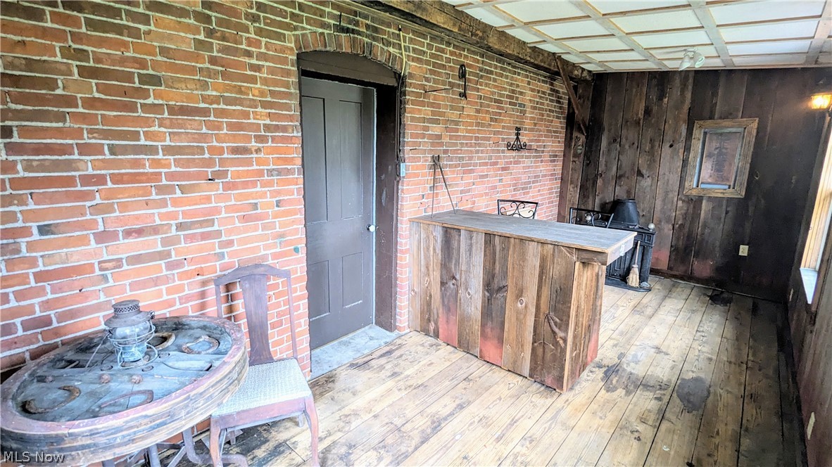 336 State Rte 61 Norwalk, OH 44857 - Photo 26 of 45 ENCLOSED PORCH/BAR AREA
