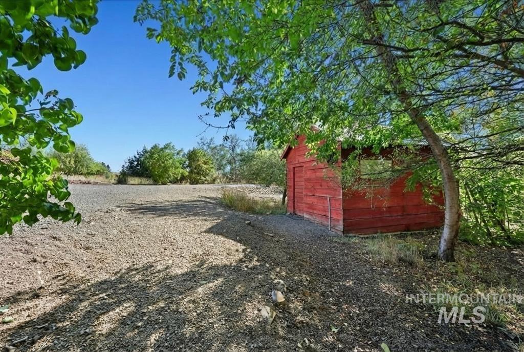 2651 Fruitvale Glendale Road Council, ID 83612 - Photo 20 of 25 View of yard with an outbuilding