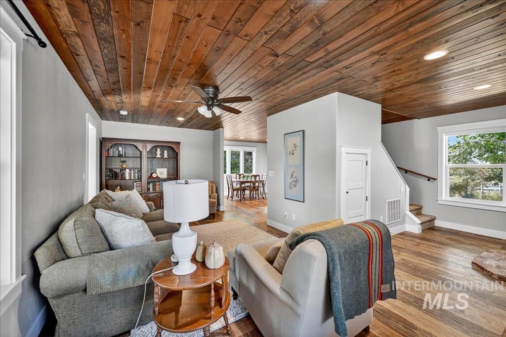 2651 Fruitvale Glendale Road Council, ID 83612 - Photo 5 of 25 Living area featuring wooden ceiling, ceiling fan, and wood finished floors