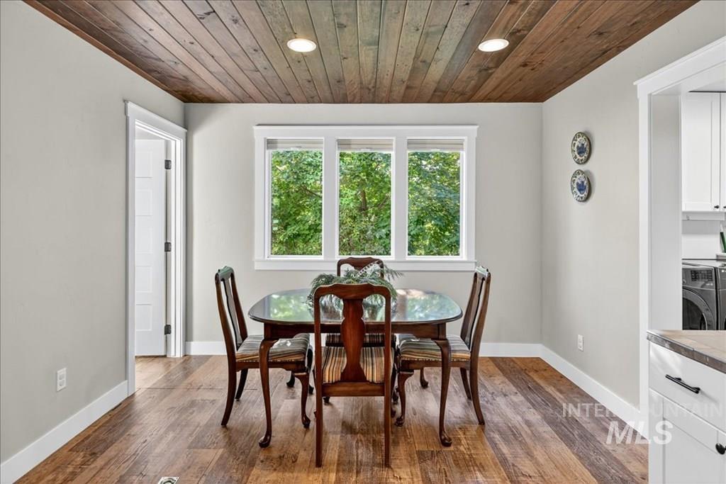 2651 Fruitvale Glendale Road Council, ID 83612 - Photo 8 of 25 Dining room featuring wood ceiling, dark wood-style flooring, recessed lighting, and washer / clothes dryer