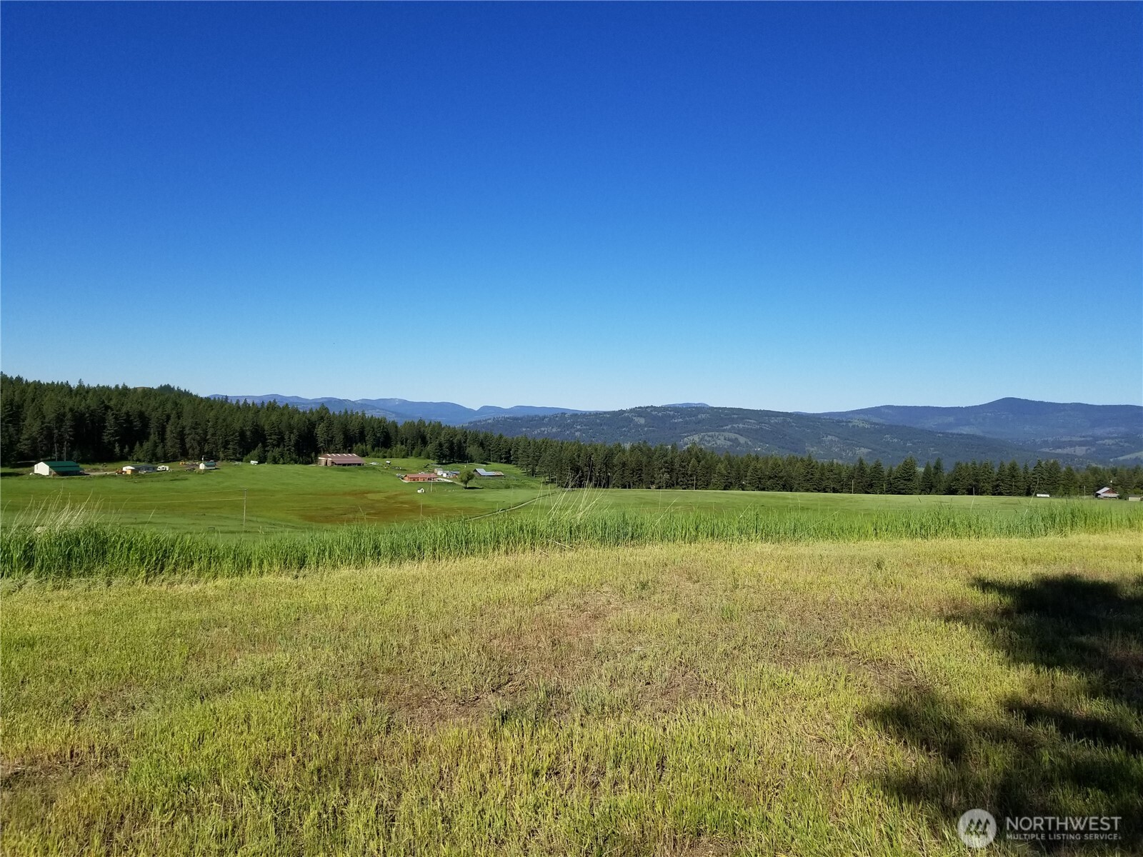 49 Old Ranch House Road Republic, WA 99166 - Photo 6 of 13 a view of a lake and mountain view