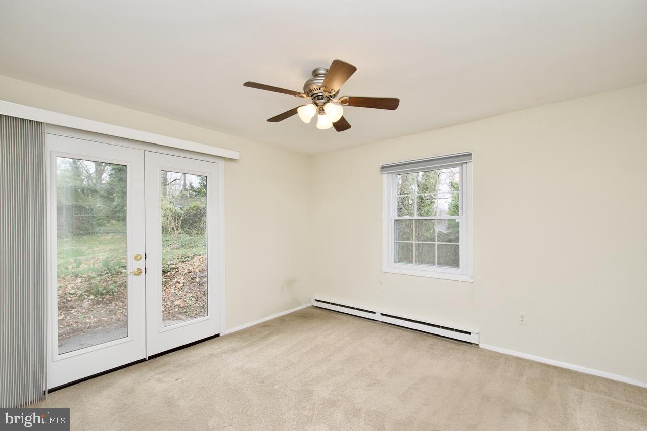 5509 Glenallen Street Springfield, VA 22151 - Photo 19 of 36 a view of an empty room with a window