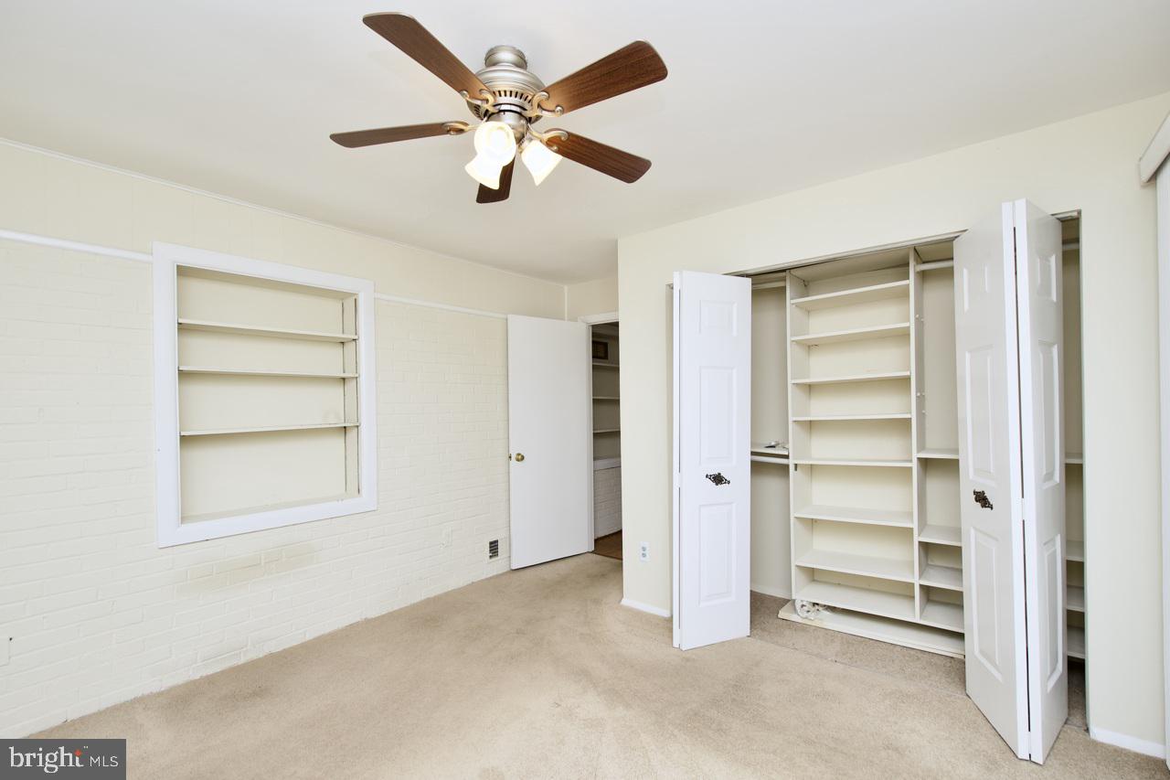 5509 Glenallen Street Springfield, VA 22151 - Photo 20 of 36 a view of an empty room with a window