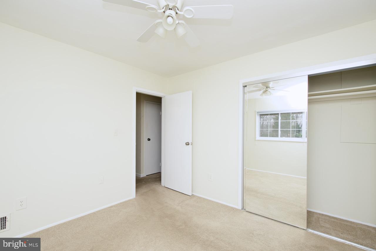 5509 Glenallen Street Springfield, VA 22151 - Photo 22 of 36 a view of an empty room with a window