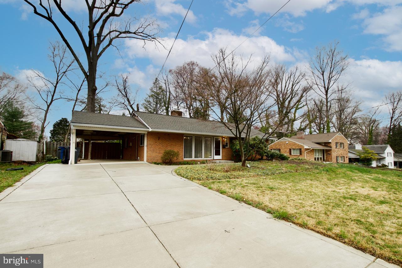 5509 Glenallen Street Springfield, VA 22151 - Photo 3 of 36 a front view of a house with a yard