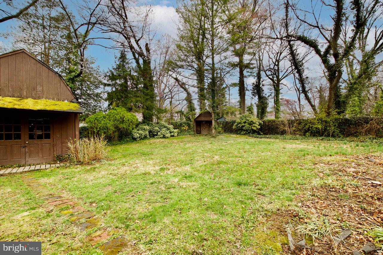 5509 Glenallen Street Springfield, VA 22151 - Photo 31 of 36 a view of a house with a yard