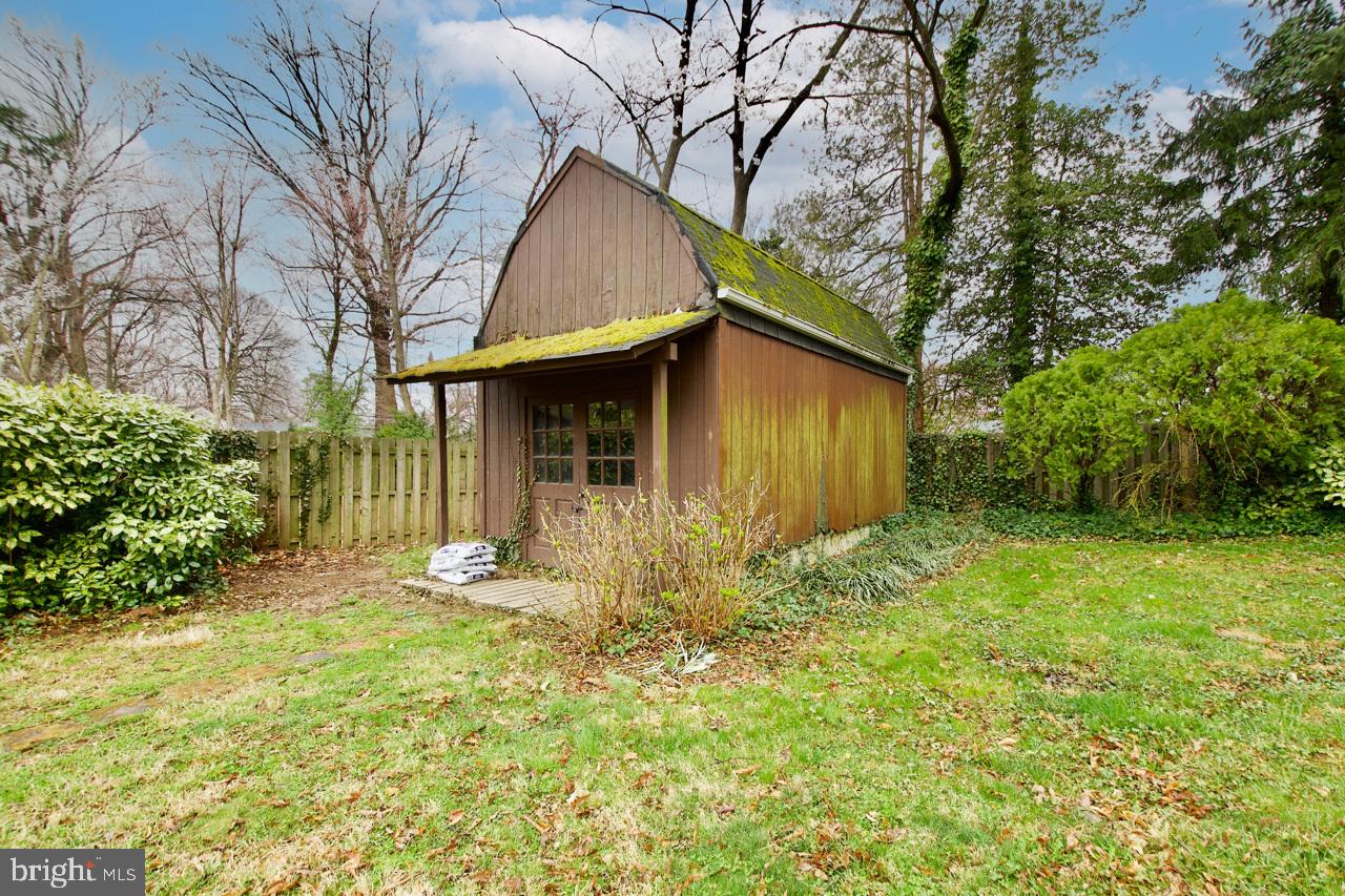 5509 Glenallen Street Springfield, VA 22151 - Photo 33 of 36 a front view of house with small garden