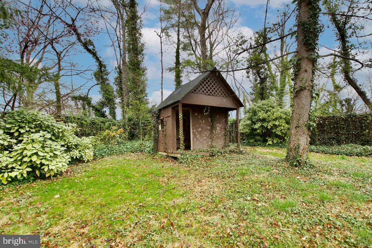 5509 Glenallen Street Springfield, VA 22151 - Photo 34 of 36 a front view of a house with a yard