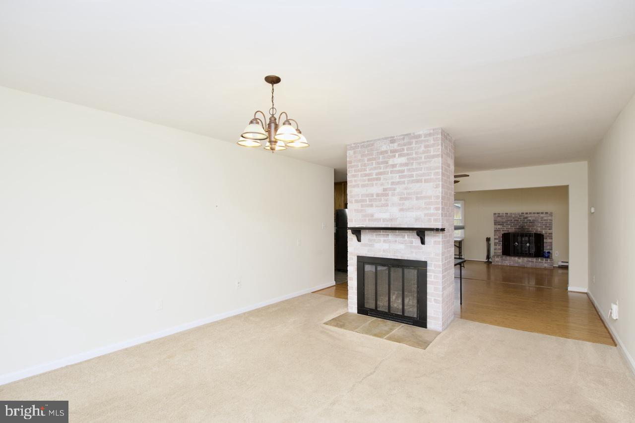 5509 Glenallen Street Springfield, VA 22151 - Photo 4 of 36 a view of a livingroom with a fireplace