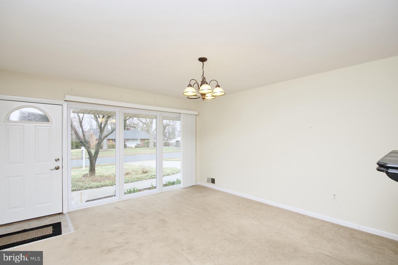 5509 Glenallen Street Springfield, VA 22151 - Photo 5 of 36 an empty room with a window