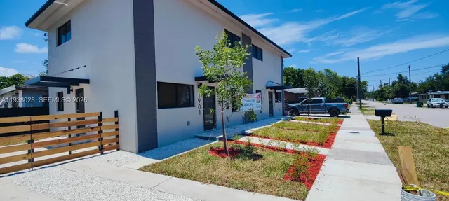 a view of swimming pool with outdoor seating