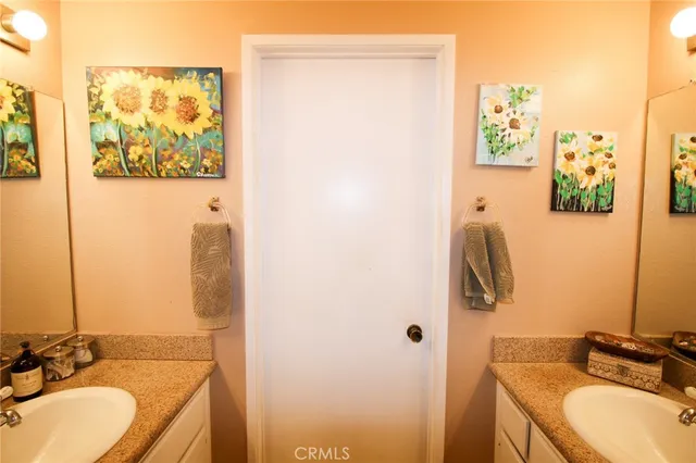 a bedroom with a bed and a table