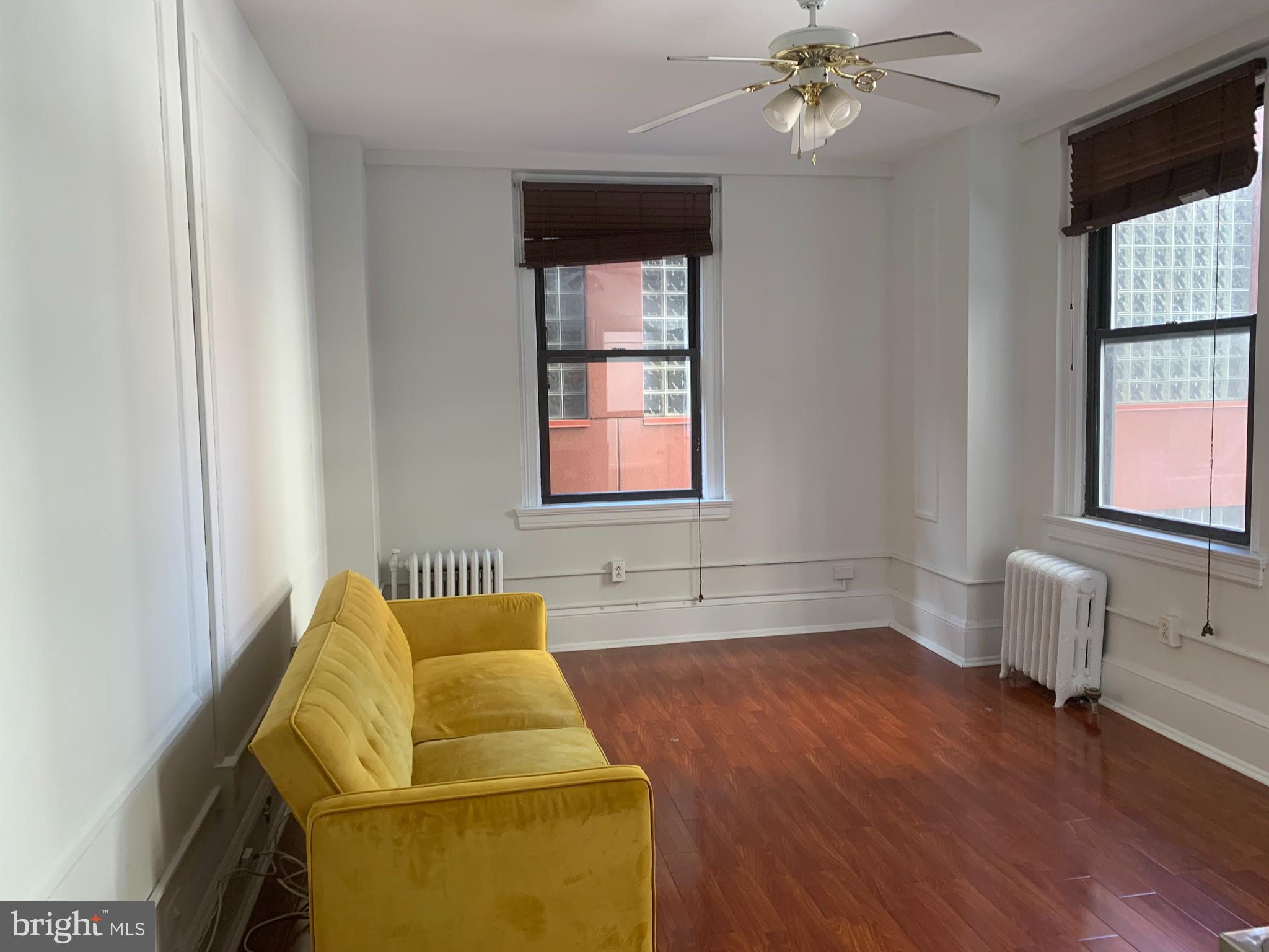 1324 Locust Street, Unit 819 Philadelphia, PA 19107 - Photo 17 of 17 a room with a bed and window