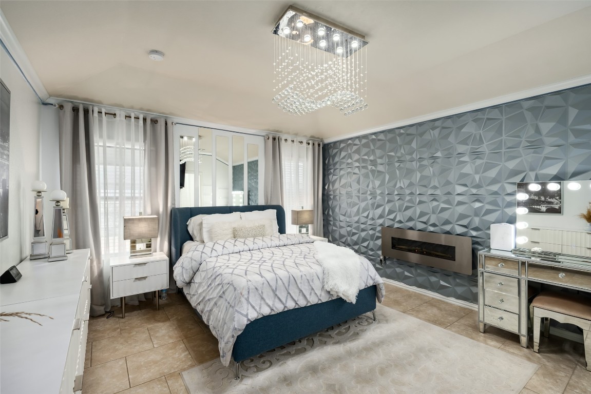 355 Evening Star Kyle, TX 78640 - Photo 11 of 21 Wall with curved panels and chandelier.