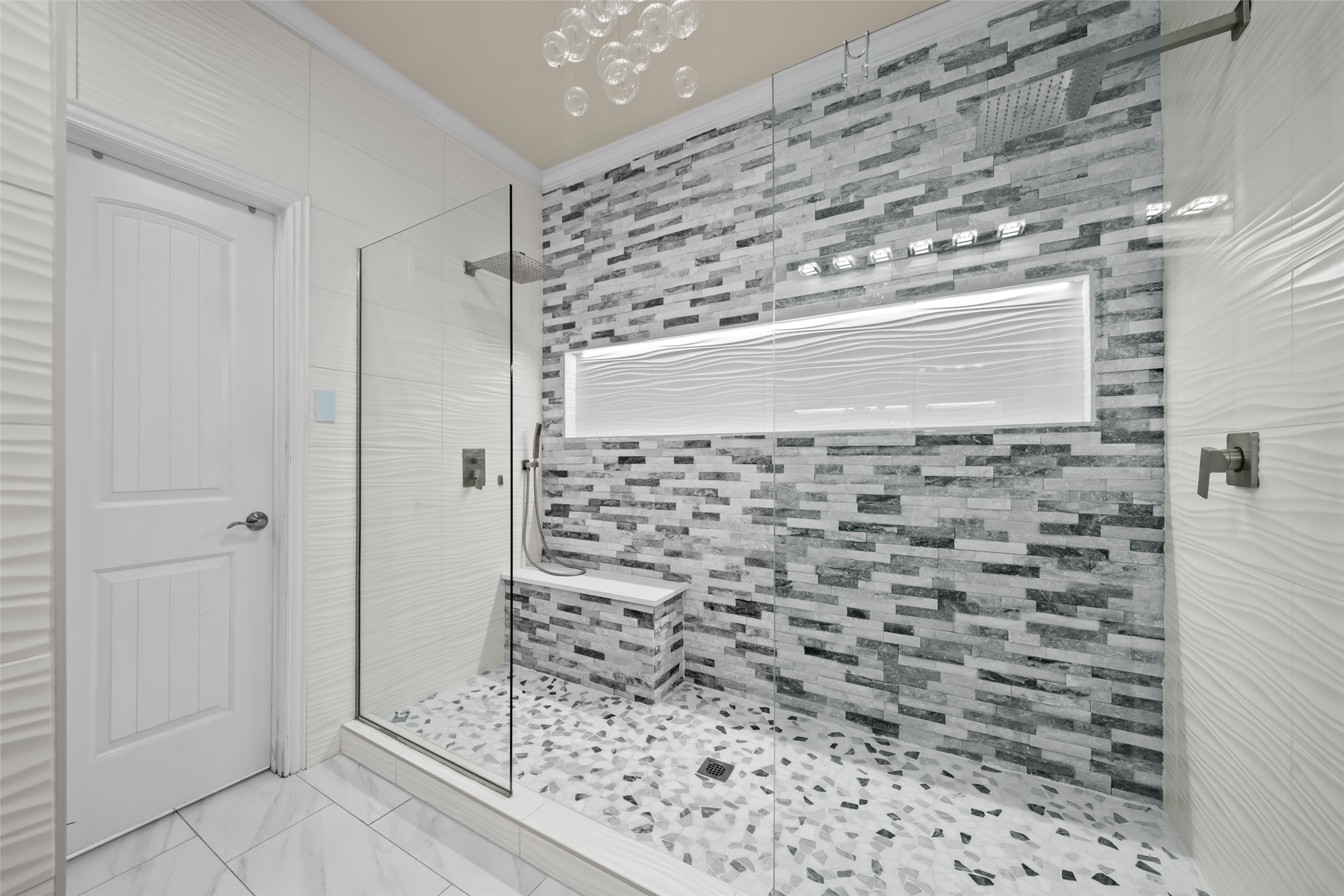 355 Evening Star Kyle, TX 78640 - Photo 12 of 21 a bathroom with a shower and a tiled wall