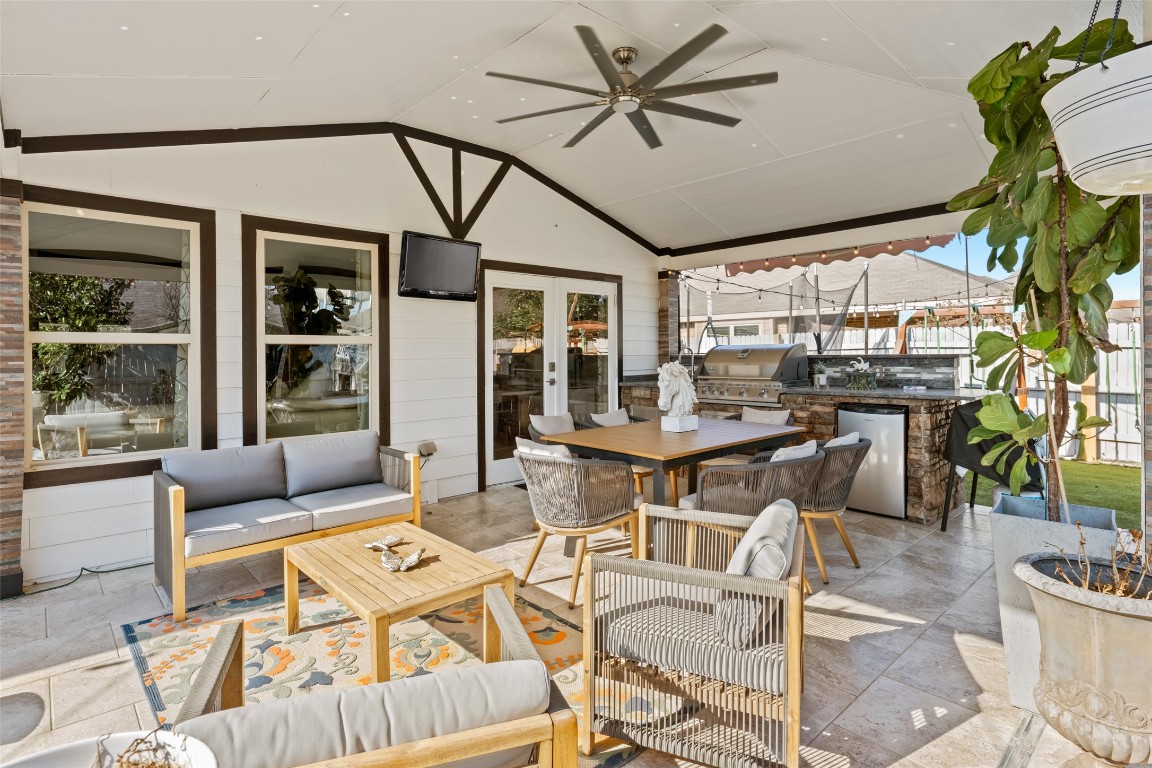355 Evening Star Kyle, TX 78640 - Photo 19 of 21 Large area that incorporates outdoor grilling with a sitting and dining area.
