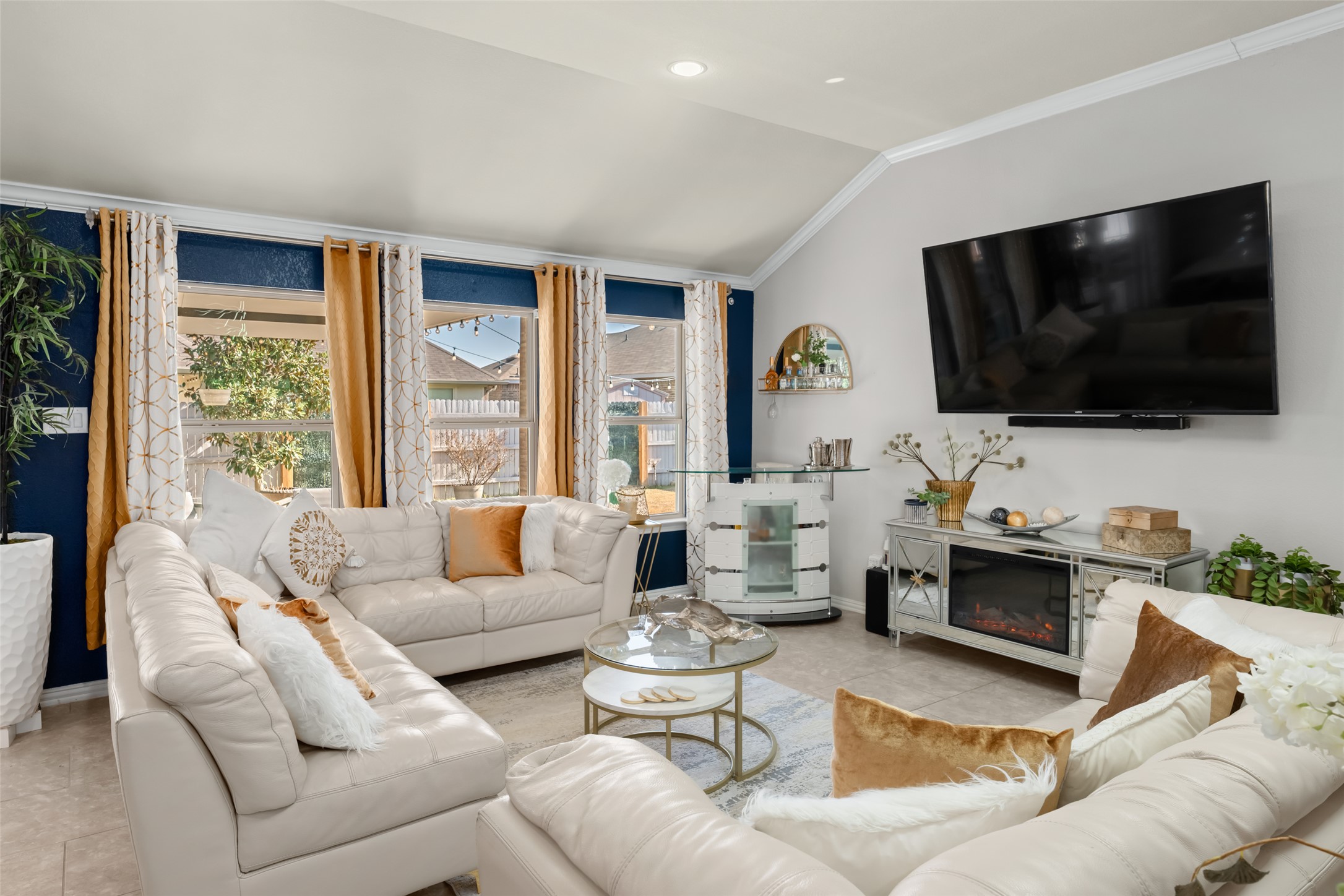 355 Evening Star Kyle, TX 78640 - Photo 2 of 21 a living room with furniture and a flat screen tv