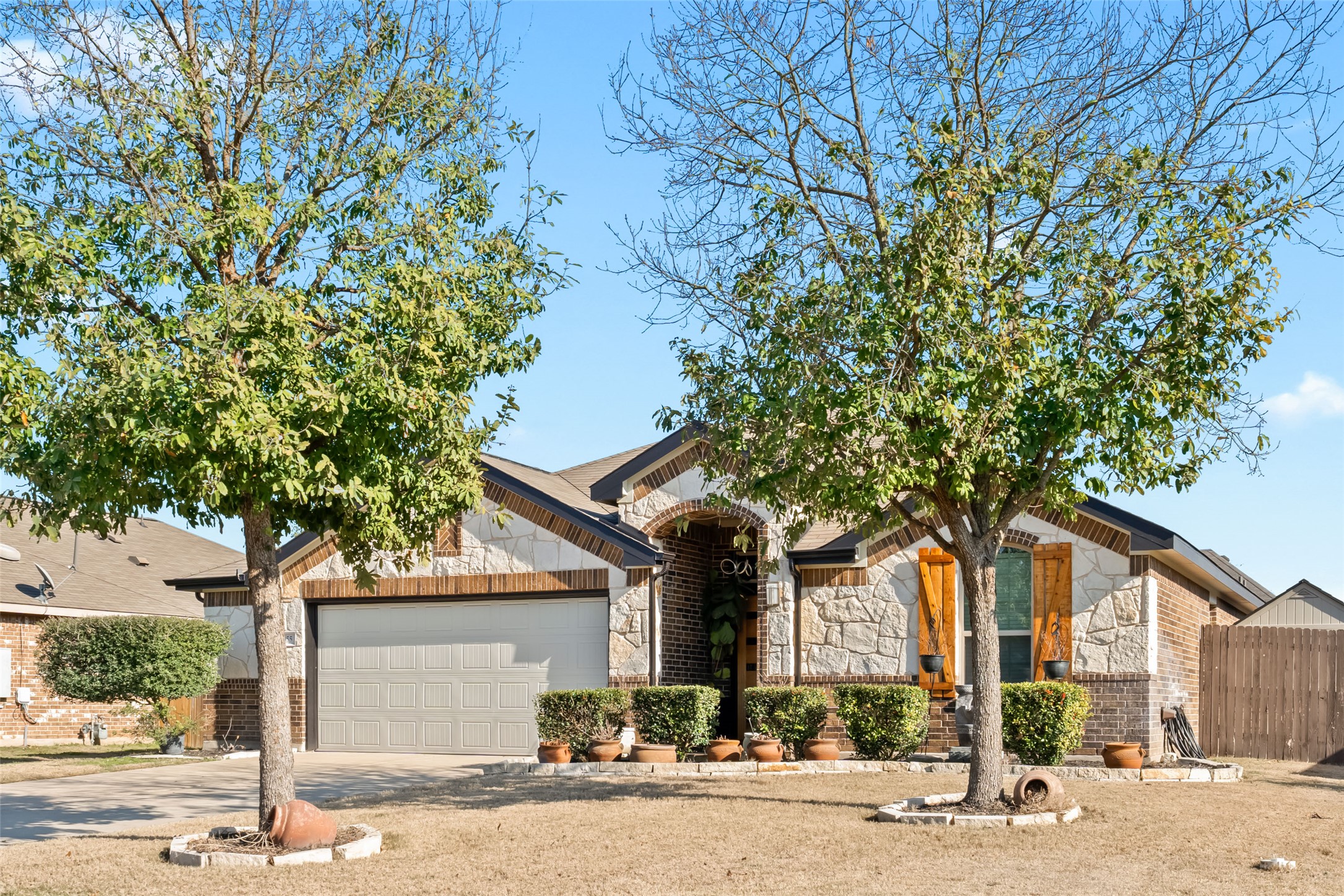 355 Evening Star Kyle, TX 78640 - Photo 21 of 21 front view of a house with a tree
