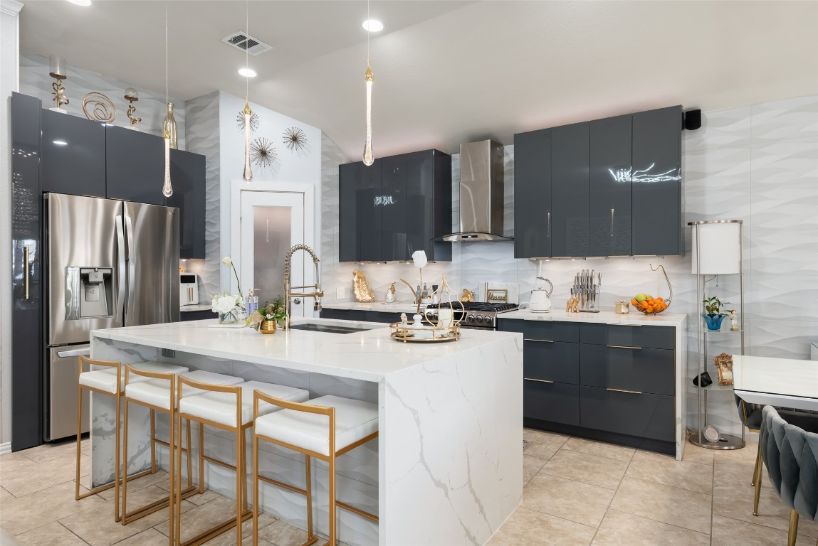 355 Evening Star Kyle, TX 78640 - Photo 7 of 21 Kitchen features soft close cabinet drawers, pull outs, and interior drawer lighting.