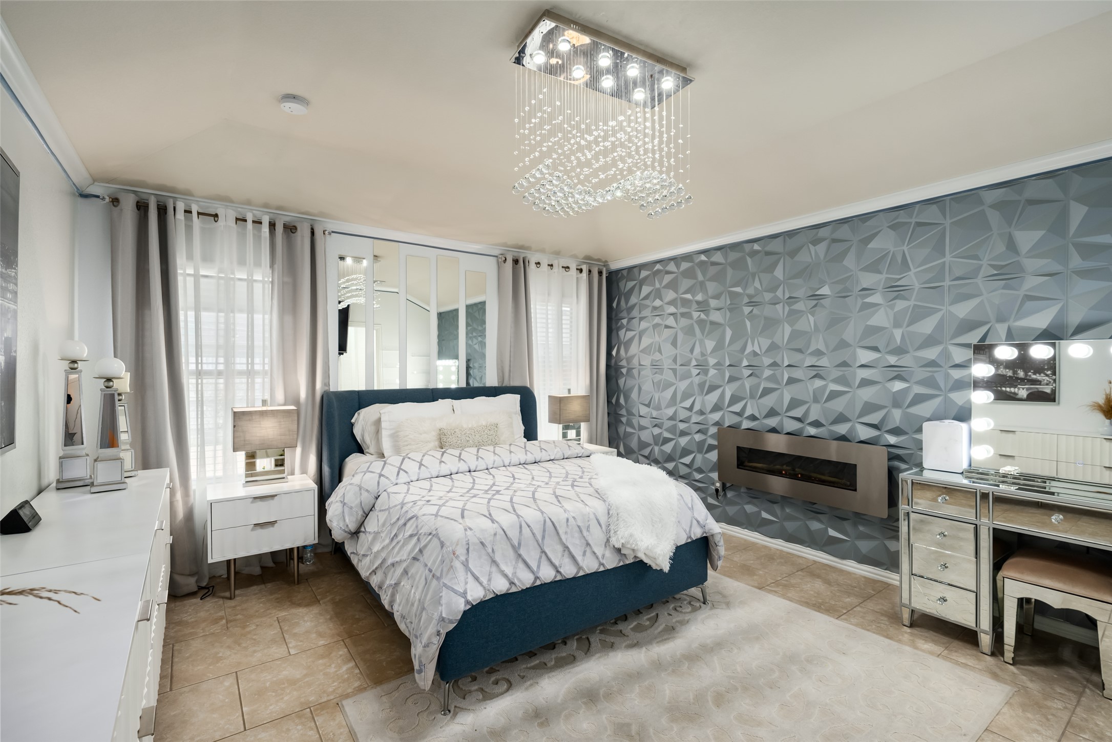 355 Evening Star Kyle, TX 78640 - Photo 10 of 21 a spacious bedroom with a bed and a fireplace