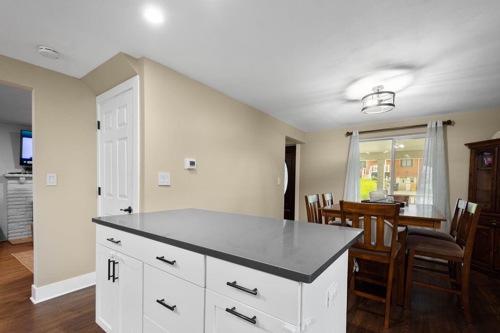 2026 Borland Road Pittsburgh, PA 15243 - Photo 11 of 34 a view of a kitchen area with furniture and wooden floor