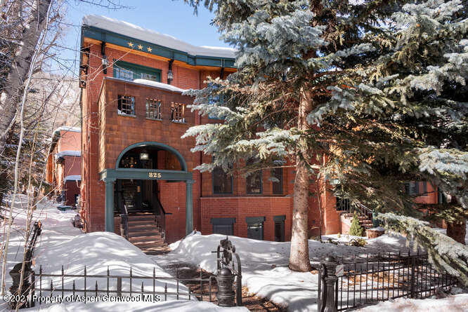 825 Ute Avenue, Unit A Aspen, CO 81611 - Photo 3 of 23 a front view of a building with parking