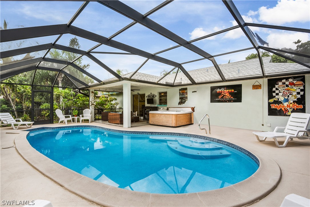 12478 Dolphin Road Bokeelia, FL 33922 - Photo 22 of 25 a view of indoor pool and sitting area