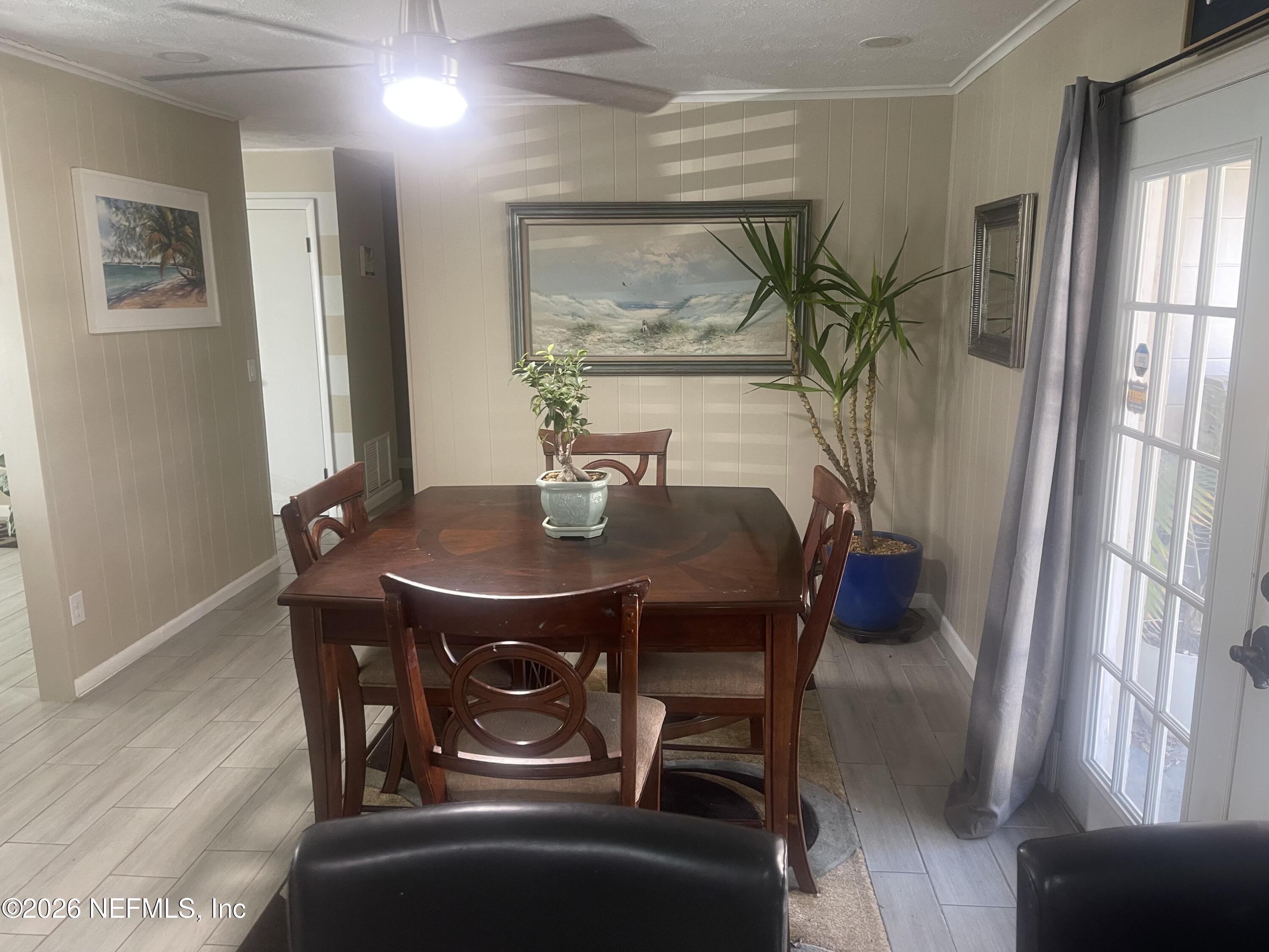 5203 Clarendon Road Jacksonville, FL 32205 - Photo 14 of 14 a dining room with furniture and window