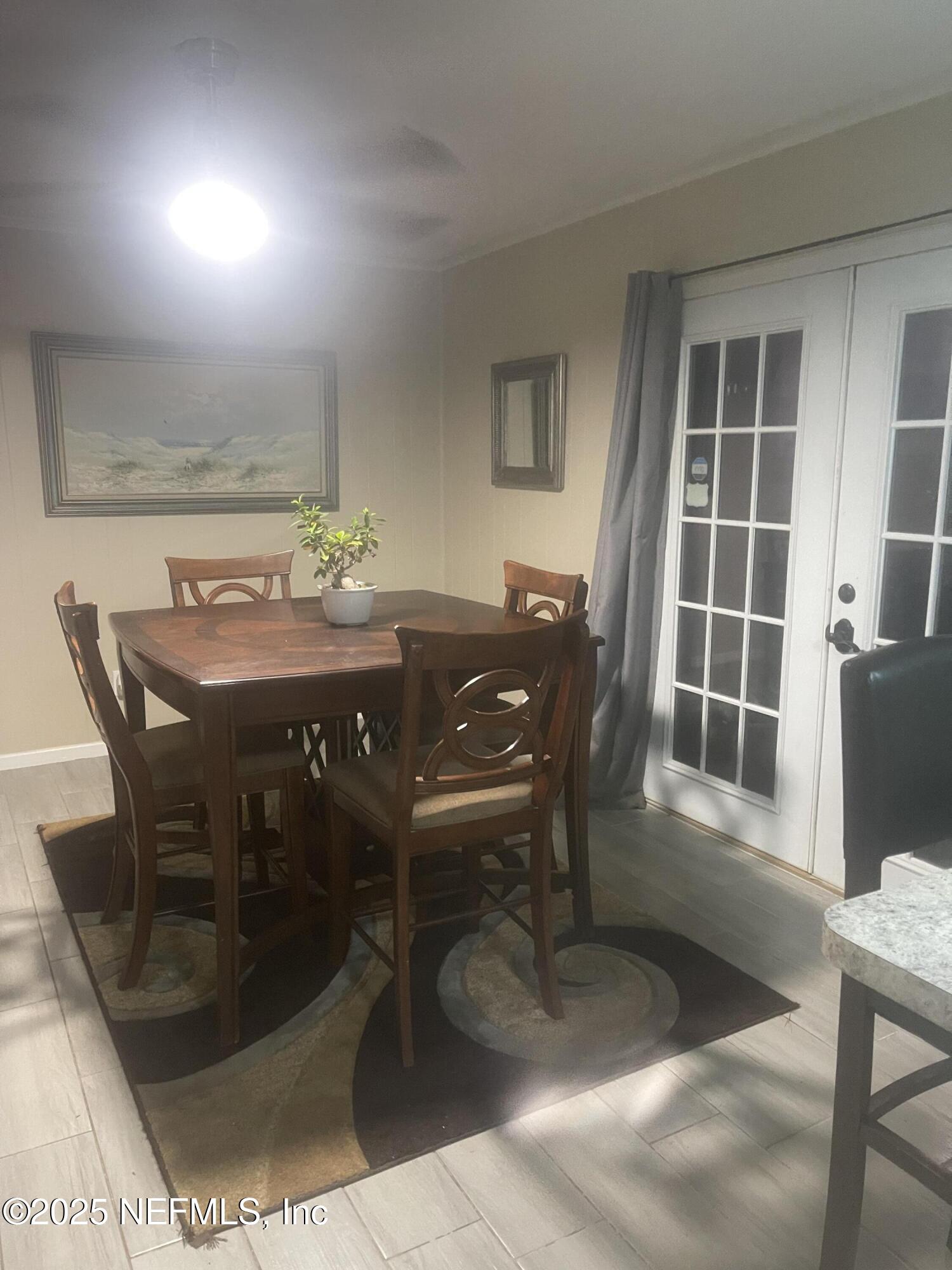 5203 Clarendon Road Jacksonville, FL 32205 - Photo 4 of 12 a view of a dining room with furniture