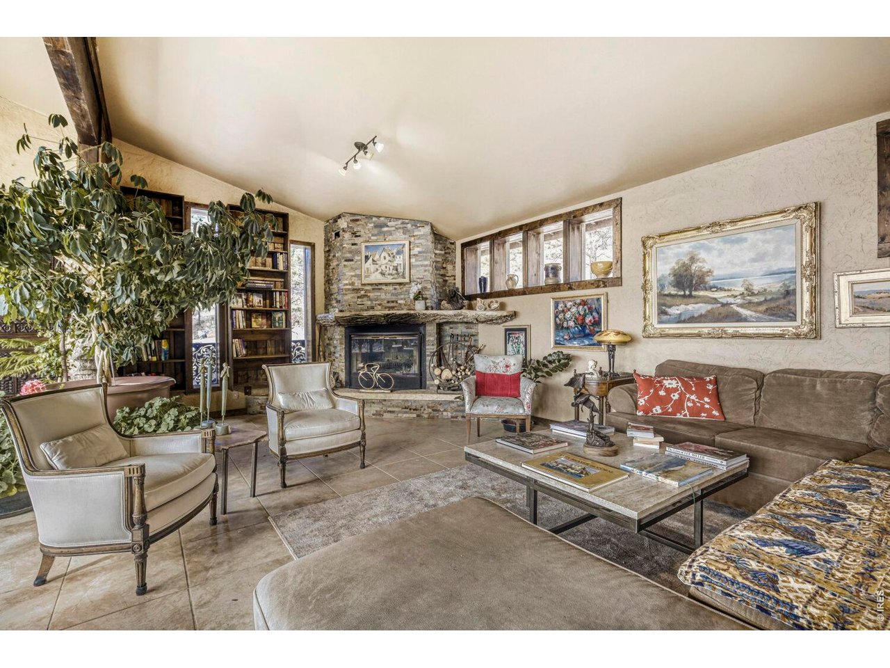 1042 Steamboat Valley Road Lyons, CO 80540 - Photo 6 of 46 Tile Floors expand this large Solarium living room