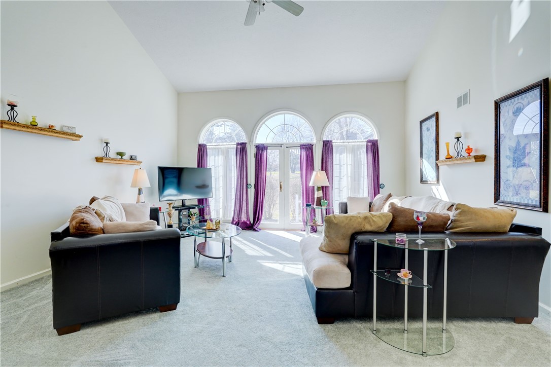 65 Cloverdale Street Rochester, NY 14612 - Photo 6 of 50 Great room feels great with the soaring ceilings a