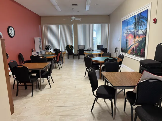 a view of a dining room with furniture