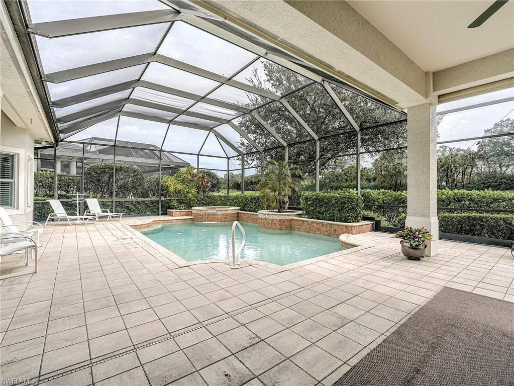 10128 Idle Pine Lane Estero, FL 34135 - Photo 30 of 50 a view of indoor pool and sitting area