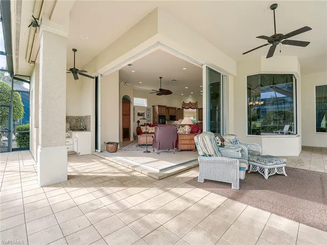 a view of a livingroom with furniture and windows