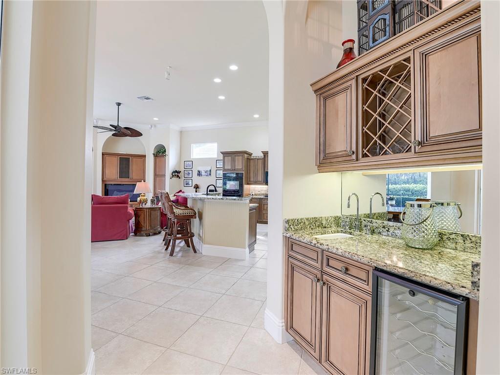 10128 Idle Pine Lane Estero, FL 34135 - Photo 8 of 50 a living room with granite countertop furniture and a sink