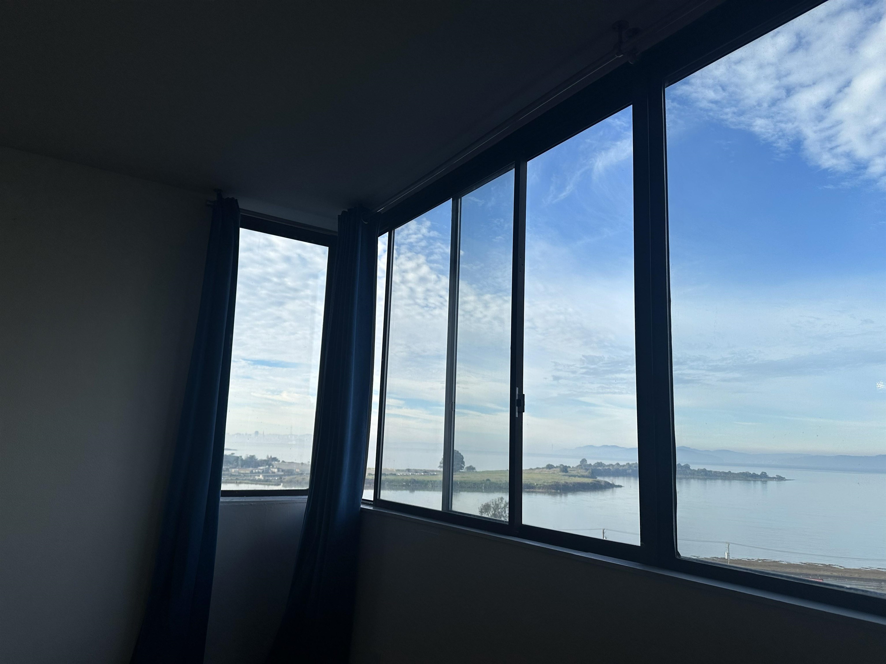 555 Pierce Street, Unit 735 Albany, CA 94706 - Photo 4 of 17 a view of an empty room and window