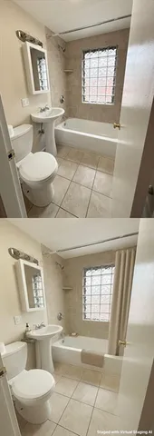 a bathroom with a toilet a sink and a window