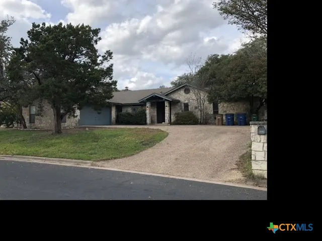 a view of house with outdoor space